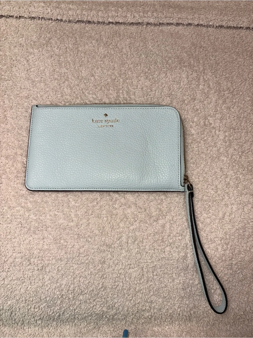 kate spade light blue pebbled leather wristlet phone case